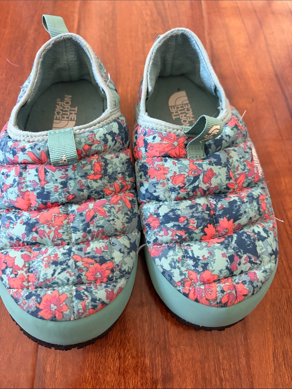 The North Face Kids Floral Puffy Slip-On Shoes in Teal and Coral